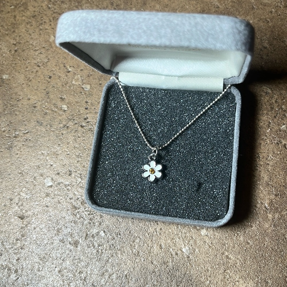 Silver Sunflower with yellow middle 8.5”